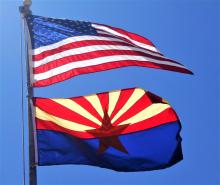 american flag flown with the state of arizona flag